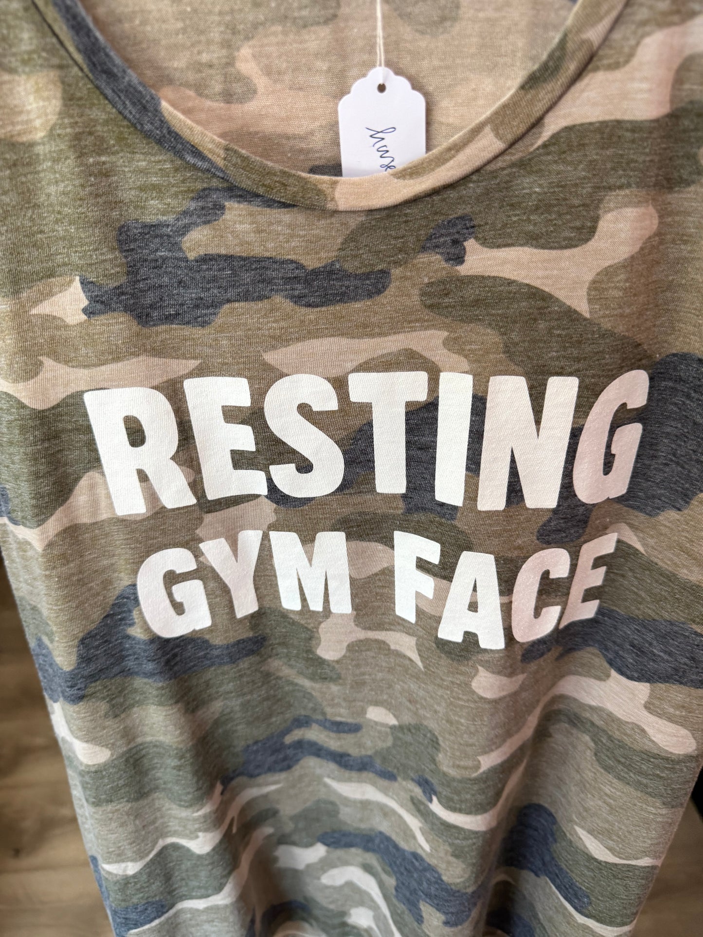 “Resting gym face muscle” tank