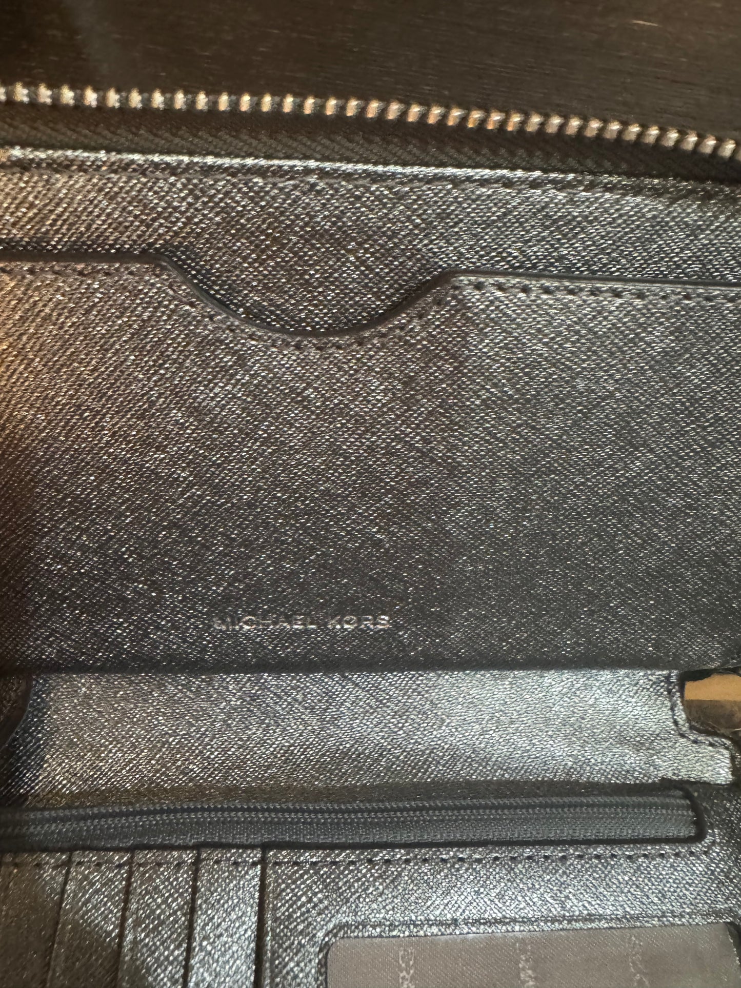 MK Metallic Look Zip Around Wallet